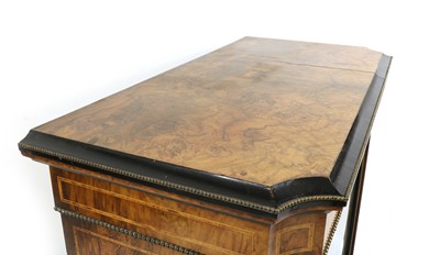 Lot 255 - A Victorian figured walnut and ebonised pier cabinet