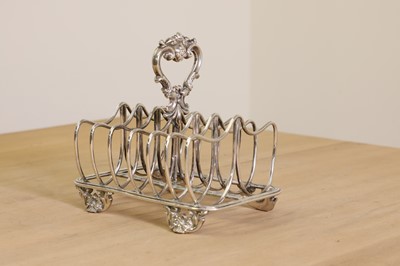 Lot 335 - A William IV silver seven-bar toast rack