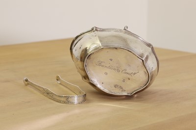 Lot 6 - A George III silver swing-handled sugar basket