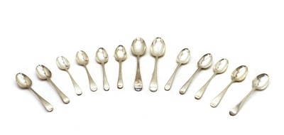Lot 12 - A set of six George III silver Old English pattern dessert spoons