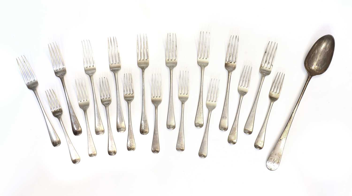 Lot 4 - Nine George III silver Old English pattern table forks