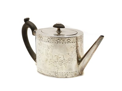 Lot 16 - A George III silver teapot