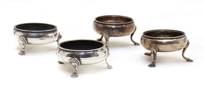 Lot 30 - Two pairs of George III silver cauldron salt cellars