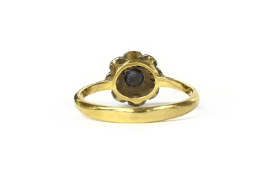 Lot 166 - A gold sapphire and diamond cluster ring