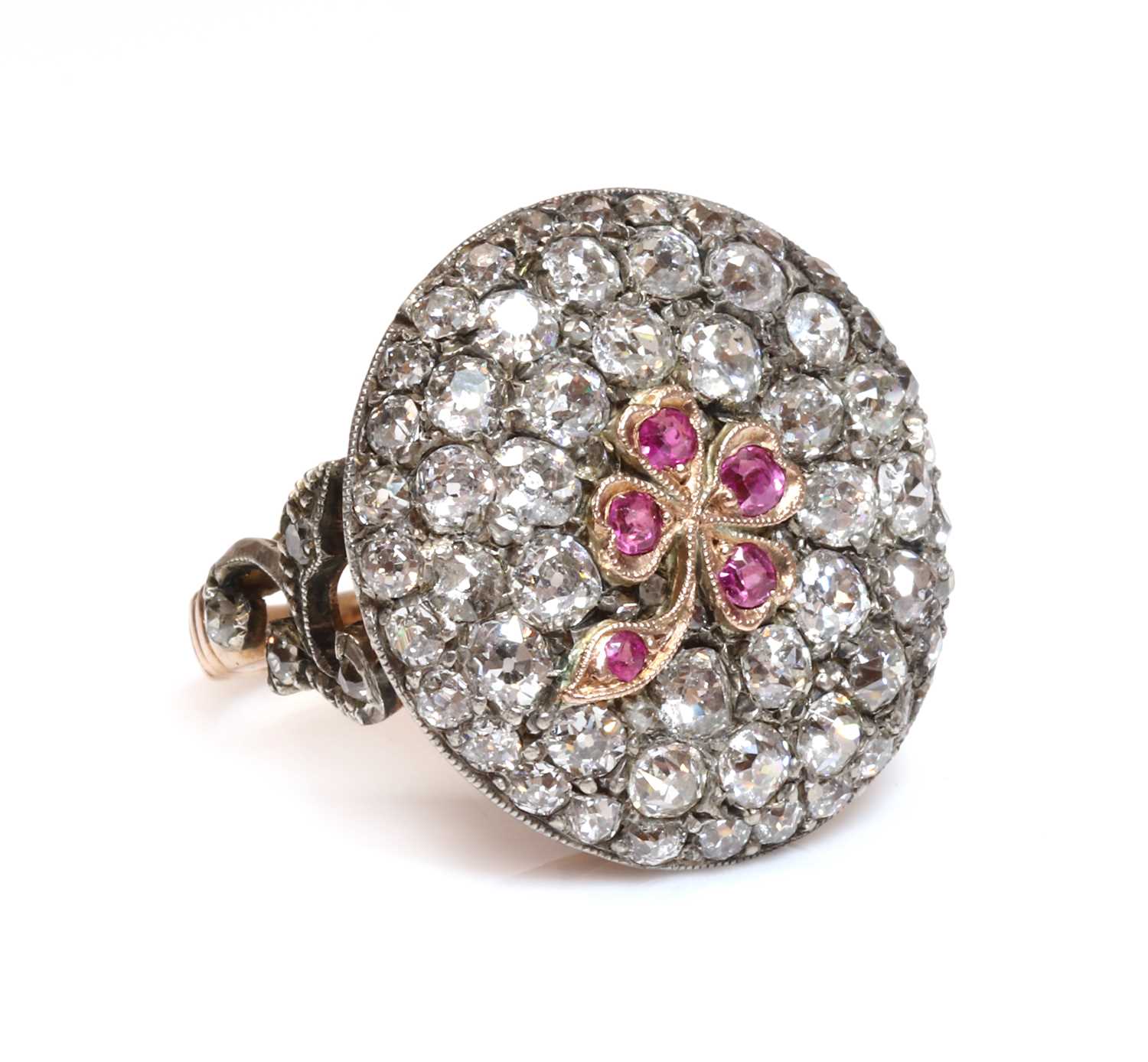 Lot 89 - A Victorian ruby and diamond four leaf clover, circular cluster