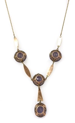 Lot 200 - A gold synthetic colour change corundum necklace