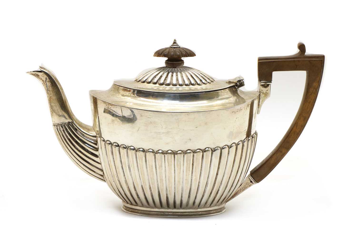 Lot 8 - A late Victorian silver teapot