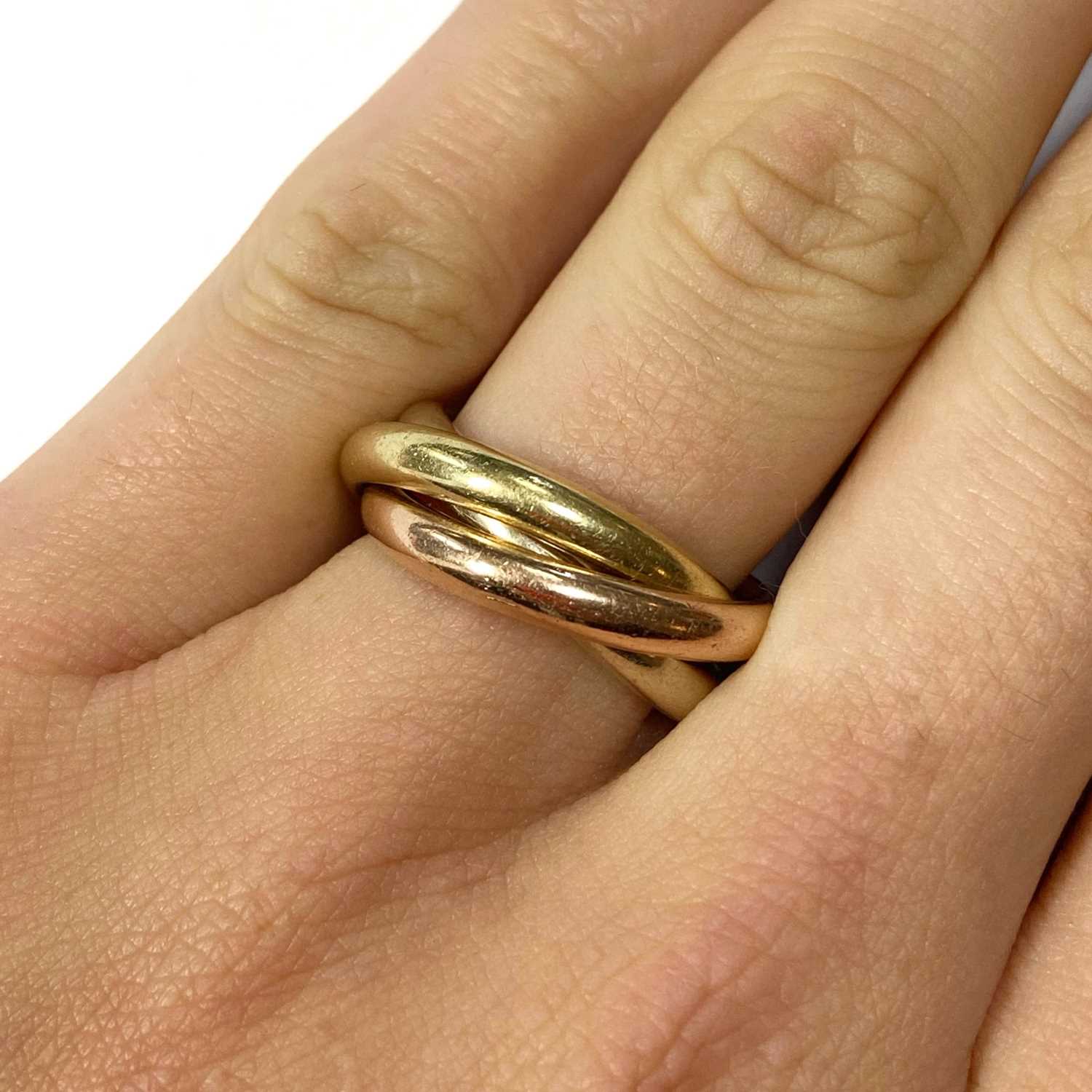 Lot 56 - A gold Russian wedding ring,
