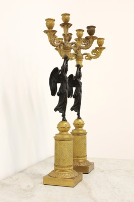 Lot 268 - A pair of Empire D'or ormolu and bronze candelabra