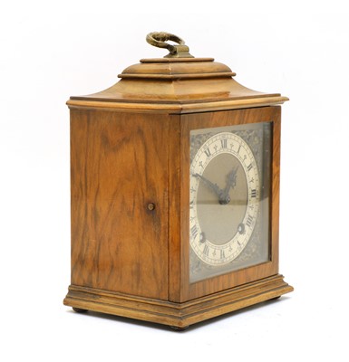 Lot 297 - An early 20th century walnut cased two train mantel clock
