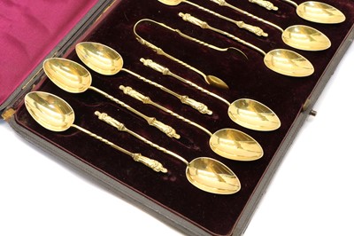 Lot 41 - A set of Victorian silver gilt apostle teaspoons and sugar tongs