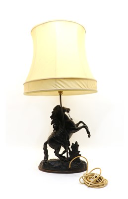 Lot 191 - After Guillaume Cousteau, a spelter Marly horse figural lamp
