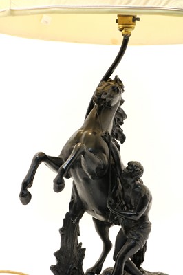 Lot 191 - After Guillaume Cousteau, a spelter Marly horse figural lamp