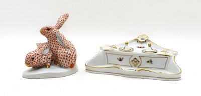 Lot 280 - A Herend porcelain figure group modelled as two rabbits