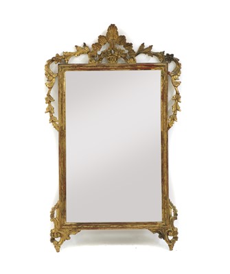 Lot 319 - An 18th century style carved gilt framed mirror