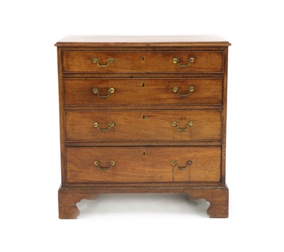 Lot 590 - A small George III mahogany chest of four long graduated drawers