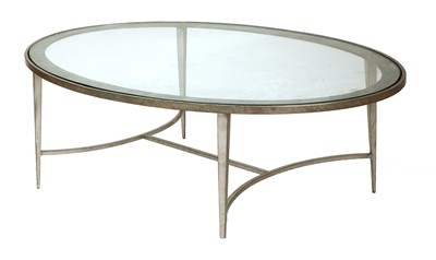 Lot 364 - An oval glass-topped aluminium coffee table