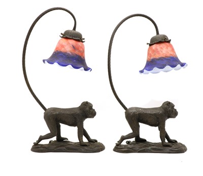 Lot 323 - A pair of bronzed table lamps