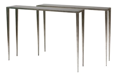 Lot 459 - A pair of contemporary moulded aluminium console tables