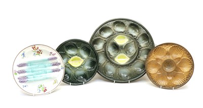 Lot 347 - A group of various French faince and pottery oyster and asparagus plates