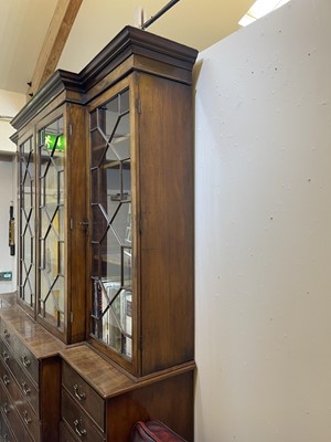 Lot 53 - A George III mahogany secretaire breakfront bookcase