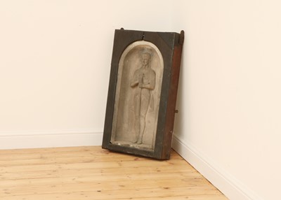 Lot 48 - A relief carved basalt panel or stele