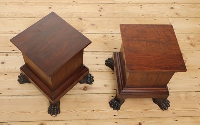 Lot 497 - A pair of simulated mahogany pedestals