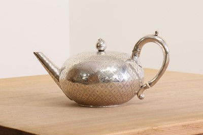 Lot 336 - A Victorian silver teapot with ivory insulators