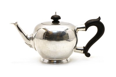 Lot 47 - A silver teapot in the George II style