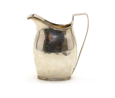 Lot 55 - A George III silver cream jug