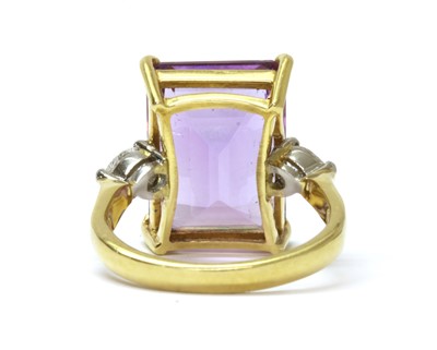 Lot 193 - An 18ct gold amethyst and diamond three stone ring