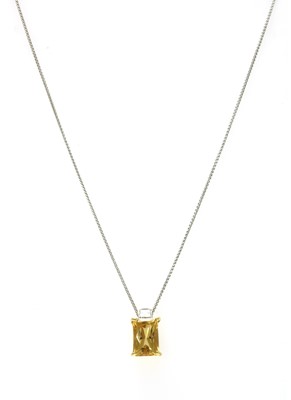 Lot 1178 - An 18ct gold citrine and diamond pendant