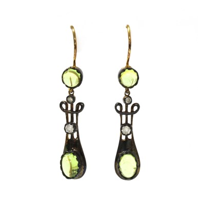 Lot 150 - A pair of silver and gold, peridot and diamond drop earrings