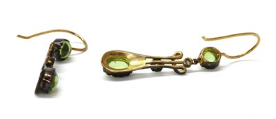 Lot 150 - A pair of silver and gold, peridot and diamond drop earrings