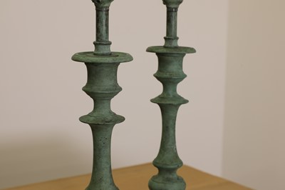 Lot 405 - A pair of verdigris candlestick lamps
