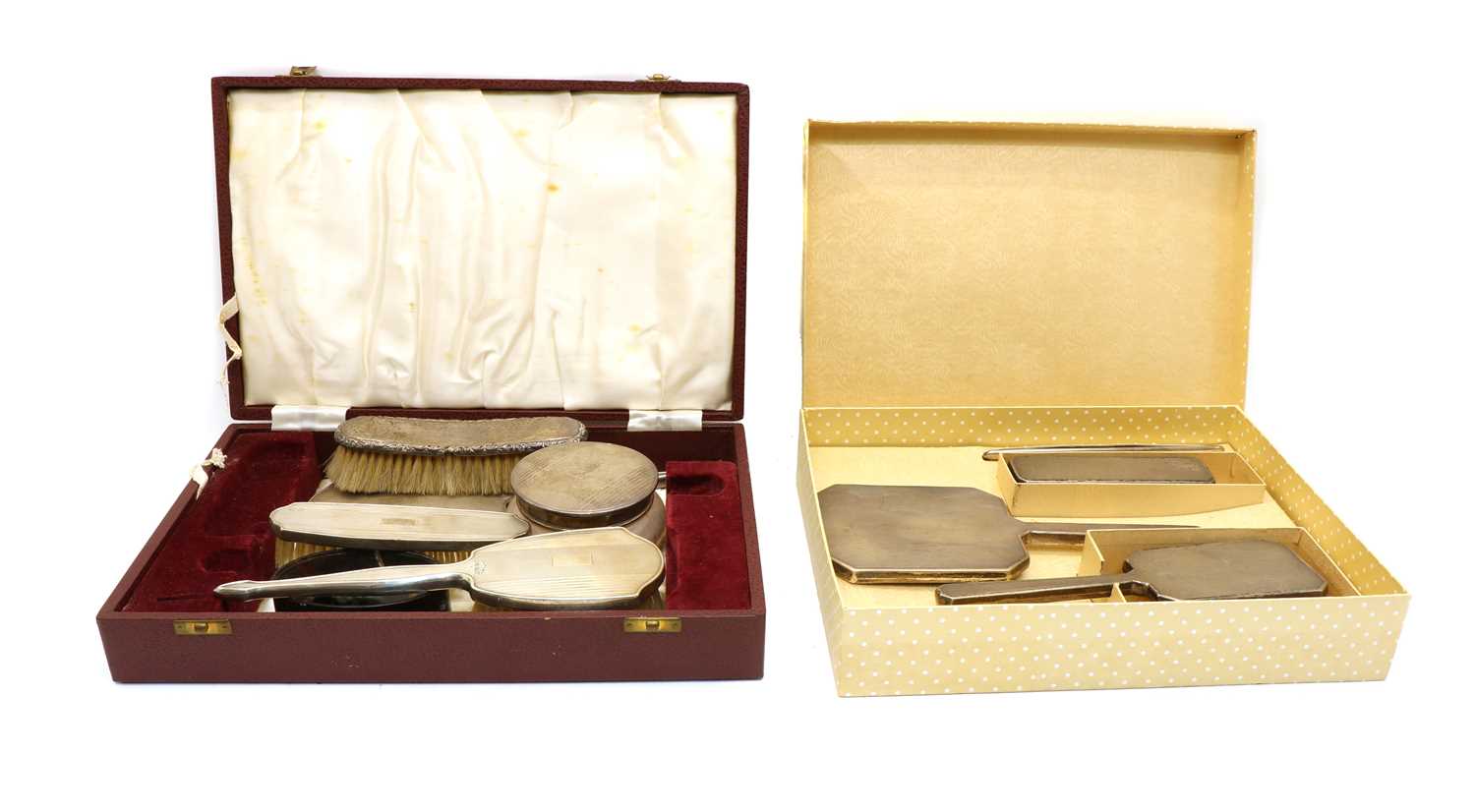 Lot 22 - A cased silver dressing table set