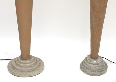 Lot 689 - Two fibreglass and plaster floor lamps