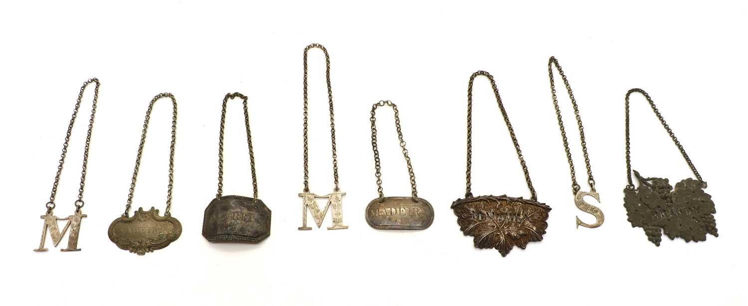 Lot 59 - Three silver decanter labels