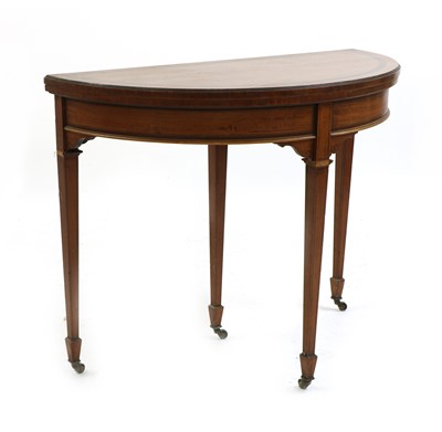 Lot 502 - An Edwardian satinwood demi lune card table