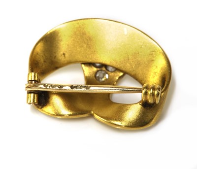 Lot 169 - A Russian gold diamond set brooch