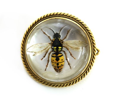 Lot 118 - A late Victorian reverse painted crystal intaglio brooch