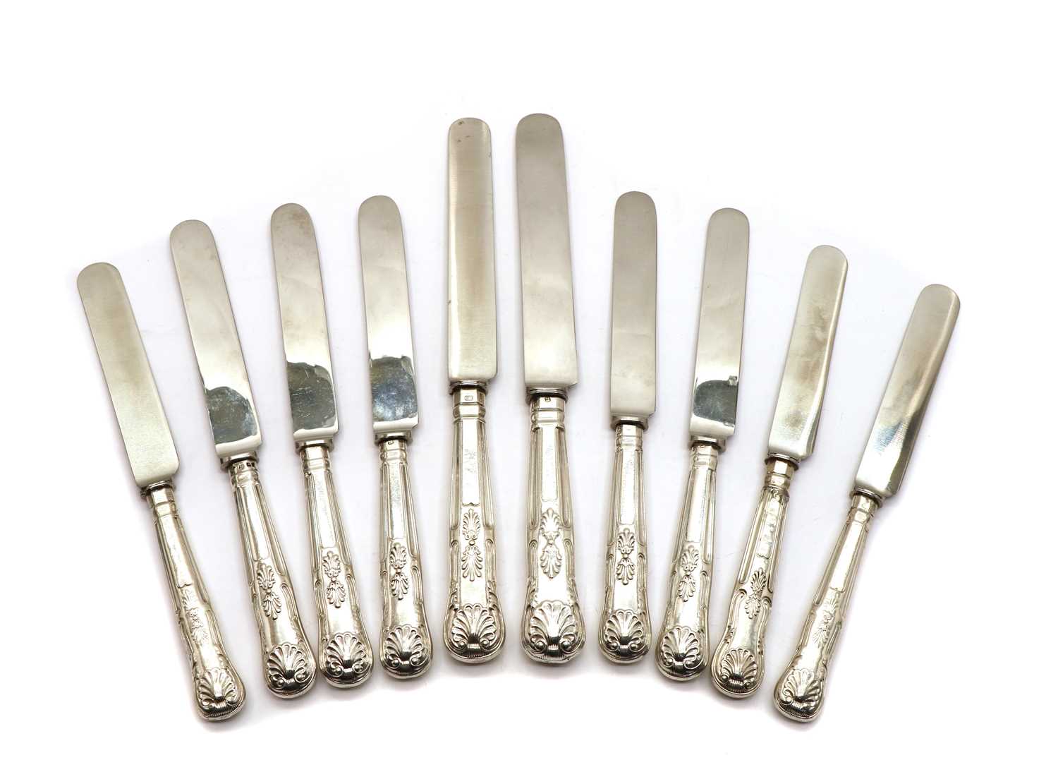 Lot 40 - A set of eighteen silver-handled Kings pattern table knives