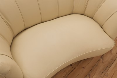 Lot 243 - An Art Deco cream leather settee