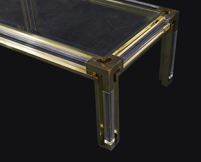 Lot 718 - A Lucite and brass coffee table