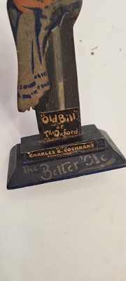 Lot 47 - A painted wood jigsaw cut upstand of ' Old Bill at Oxford'