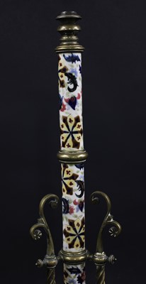 Lot 26 - A Hungarian porcelain and brass adjustable standard lamp