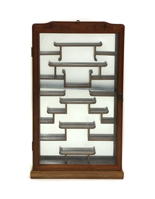 Lot 588 - A Chinese hardwood wall display cabinet