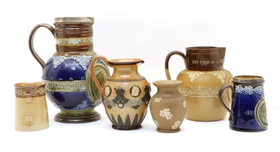 Lot 287 - A collection of Doulton commemorative stoneware