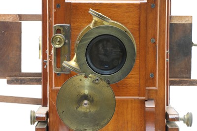 Lot 97 - A Victorian mahogany magic slide lantern