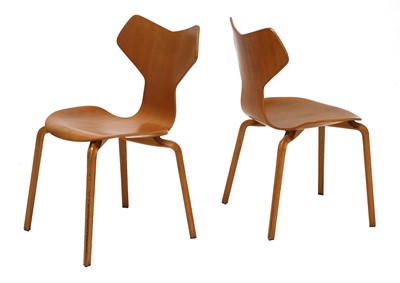 Lot 591 - A pair of teak 'Grand Prix' chairs